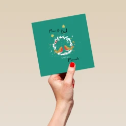 Pod Personalised Mum & Dad Illustrated Robins And Wreath Christmas Card 9 Pod Personalised Mum & Dad Illustrated Robins And Wreath Christmas Card -Pod Shop F3006089 hand L